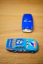 Mattel Weathers and Hudson toy model car from the Disney Pixar Cars series on a wooden surface