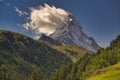 Matterhorn mountain near Zermatt city with flowers abd trees in the foreground. Canton of Valais Royalty Free Stock Photo