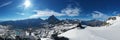 Matterhorn with panoramic view in the intense blue sky with alpine refuge