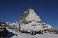 Matterhorn peak in Zermatt in winter with snow and blue sky on a sunny day in the Alps, Switzerland Royalty Free Stock Photo