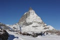 Matterhorn peak in Zermatt in winter with snow and blue sky on a sunny day in the Alps, Switzerland Royalty Free Stock Photo