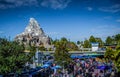 The Matterhorn standing tall amidst a crowd in Disneyland