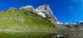 Matterhorn summit in the Alps green alpine Aosta valley lake