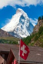 Matterhorn with Swiss flag Royalty Free Stock Photo