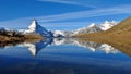 Matterhorn and Weisshorn mirroring in lake Stellisee Royalty Free Stock Photo