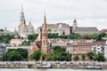 Matthias church, Fishermans bastion and Calvinist church in Budapest, Hungary Royalty Free Stock Photo