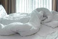 Mattress bed white sheet, duvet and pillow, messed up in the morning in the bed room. Royalty Free Stock Photo