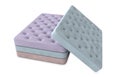 Mattress isolated on white background. Stack of orthopedic mattresses of different colors. 3d illustration Royalty Free Stock Photo