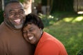 Mature African American couple laughing and hugging. Royalty Free Stock Photo