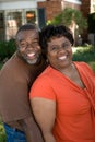 Mature African American couple laughing and hugging. Royalty Free Stock Photo