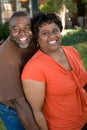 Mature African American couple laughing and hugging. Royalty Free Stock Photo