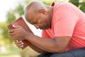 African American man praying and reading the Bible. Royalty Free Stock Photo