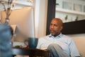 Mature African American man working from his home office. Royalty Free Stock Photo