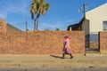 Mature african lady walking