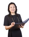 Mature Asian Woman in Business attire with note pad and glasses Royalty Free Stock Photo