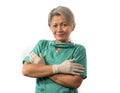 Mature attractive and happy medicine doctor woman or experienced hospital nurse in medical scrubs in face mask with hands in latex Royalty Free Stock Photo