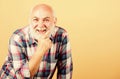 Mature bearded man in checkered shirt. positive emotions. happy old grandad. grandfather on retirement. barber and