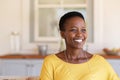 Mature black woman smiling with hope