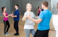 Mature blonde dancing slow ballroom dance in pair Royalty Free Stock Photo