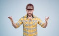 Mature builder in shirt. unshaven man on construction site. handsome building worker in hard hat. labor day. angry guy