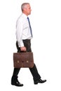 Mature businesman walking, side view. Royalty Free Stock Photo