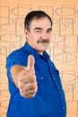 Mature business man giving thumbs up Royalty Free Stock Photo