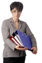 Mature business woman looking over her glasses