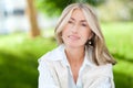 Mature business woman sitting outdoor