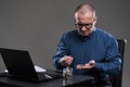 Mature businessman counting pennies Royalty Free Stock Photo