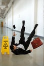 Mature Businessman Falling Royalty Free Stock Photo