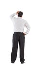 Mature businessman standing scratching head Royalty Free Stock Photo