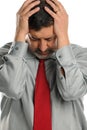 Mature businessman stressed and holding his head