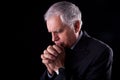 Mature businessman, thinking-praying Royalty Free Stock Photo