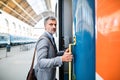 Mature businessman on a train station. Royalty Free Stock Photo