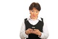 Mature businesswoman sending sms Royalty Free Stock Photo