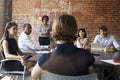 Mature Businesswoman Standing To Address Boardroom Meeting Royalty Free Stock Photo