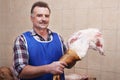 Mature butcher and meat
