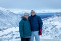 Mature Caucasian couple having their portraits taken in Hatcher& x27;s Pass, Alaska Royalty Free Stock Photo