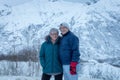 Mature Caucasian couple having their portraits taken in Hatcher& x27;s Pass, Alaska Royalty Free Stock Photo