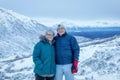 Mature Caucasian couple having their portraits taken in Hatcher& x27;s Pass, Alaska Royalty Free Stock Photo