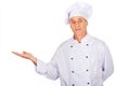 Mature chef showing copyspace on the left