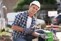 mature construction worker laying foundations Royalty Free Stock Photo