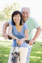 Mature couple bike riding.