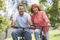 Mature couple bike riding.