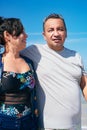 Couple calm and relax hugging each other standing at the beach during summer Royalty Free Stock Photo