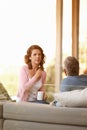 Mature couple, conversation and bonding with tea on a cabin porch, relationship and trust for discussion. Communication Royalty Free Stock Photo