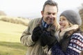 Mature couple on country picnic in winter Royalty Free Stock Photo