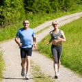 Mature couple doing sport - jogging Royalty Free Stock Photo