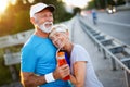 Mature couple is doing sport outdoors. Healthy lifestyle concept Royalty Free Stock Photo