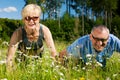 Mature couple doing sport - pushups